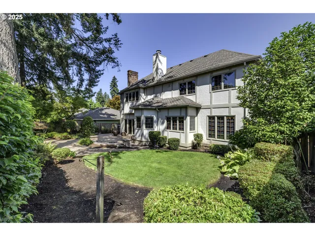 a view of a house with a yard porch and sitting area