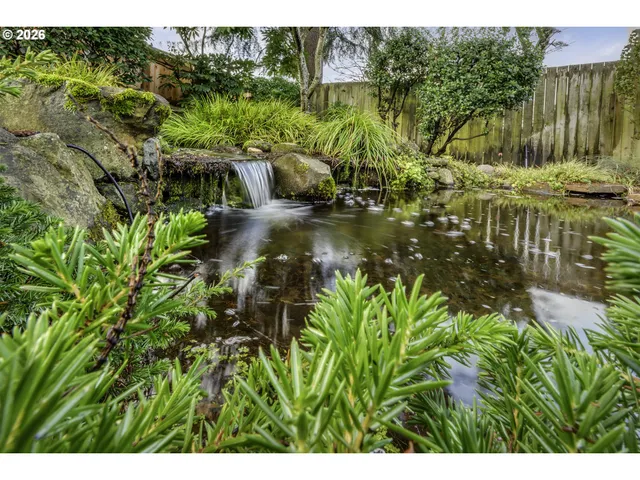 a view of outdoor space and a yard