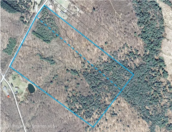 a view of entryway with wooden stairs