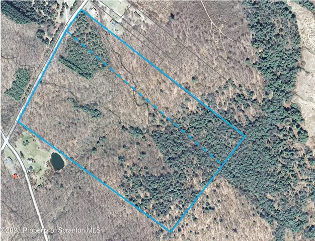 a view of entryway with wooden stairs