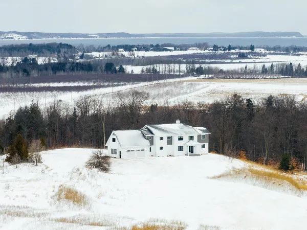 $1,990,000 | 6707 Huntsman Drive, Williamsburg, MI 49690