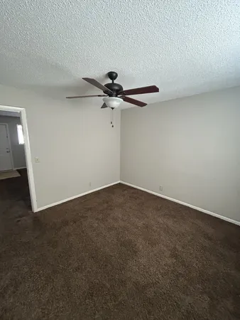 a view of a room with a fan