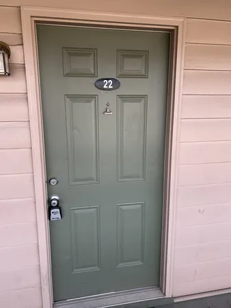 a bathroom with a glass door