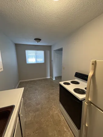 a storage room with washer and dryer