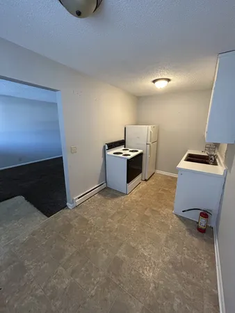 a room with furniture and window