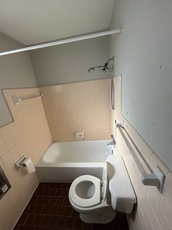 a bathroom with a sink and toilet