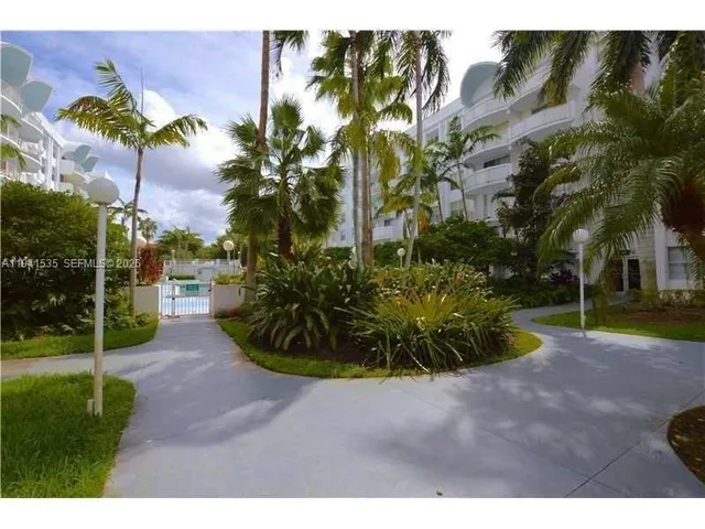 a view of a garden with a fountain