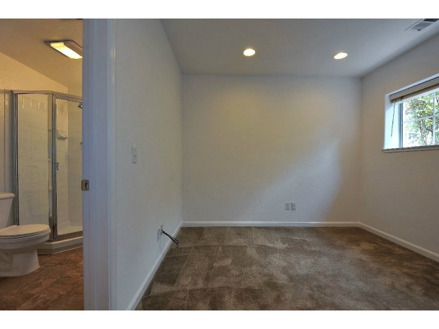 118 Pacchetti Way Mountain View, CA 94040 - Photo 11 of 18 a view of an empty room with wooden floor and a window