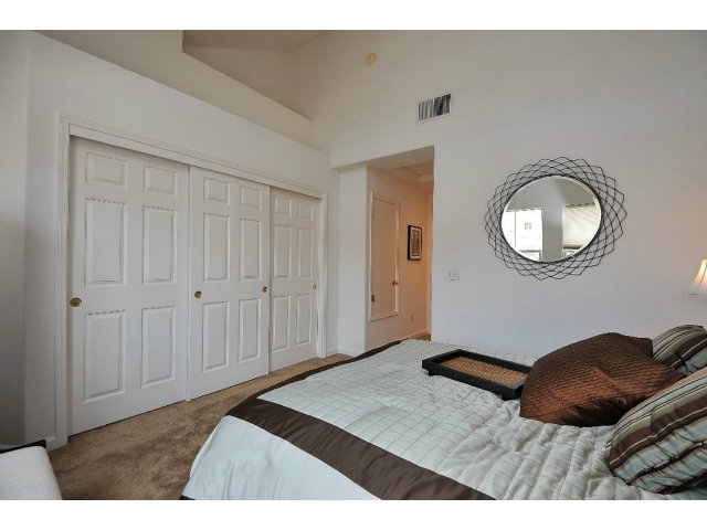 118 Pacchetti Way Mountain View, CA 94040 - Photo 14 of 18 a bedroom with a bed and a mirror