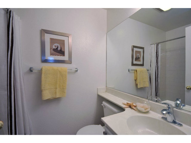 118 Pacchetti Way Mountain View, CA 94040 - Photo 17 of 18 a bathroom with a sink and mirror