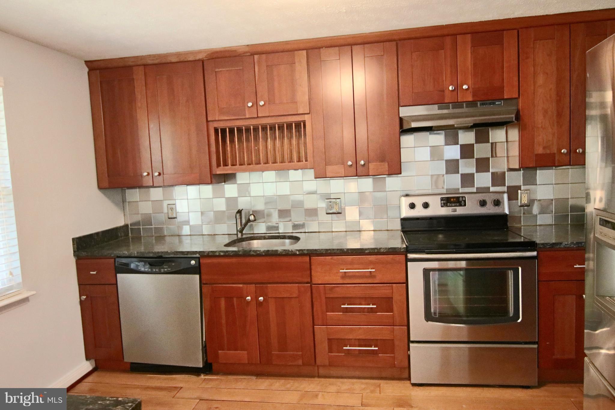 1820 Montreal Road Severn, MD 21144 - Photo 2 of 25 updated kitchen with granite and s.s. appliances