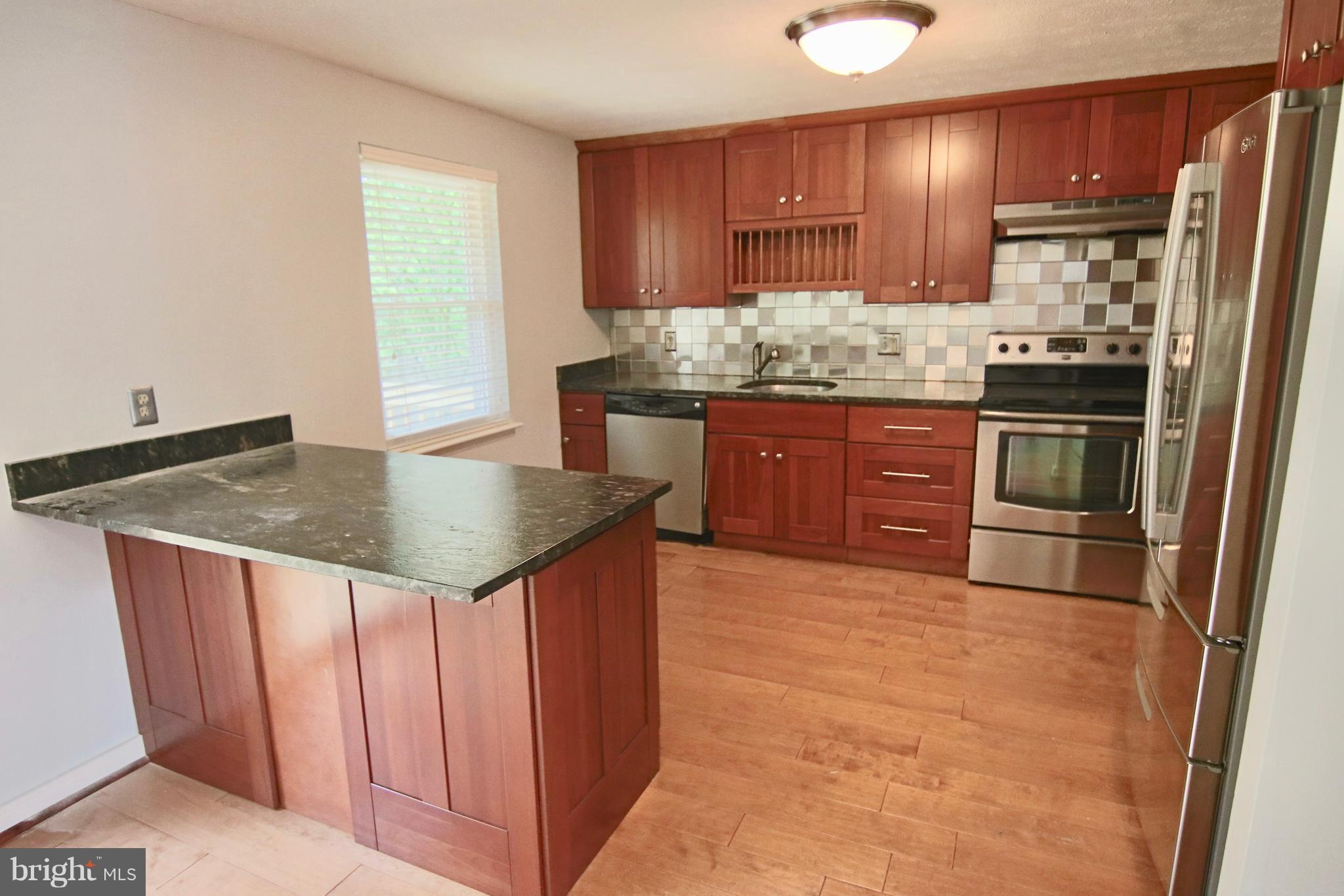 1820 Montreal Road Severn, MD 21144 - Photo 6 of 25 updated kitchen with granite and s.s. appliances