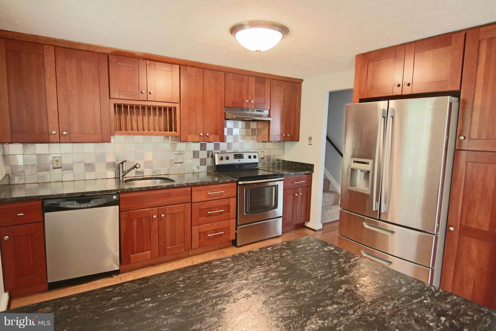 1820 Montreal Road Severn, MD 21144 - Photo 7 of 25 updated kitchen with granite and s.s. appliances