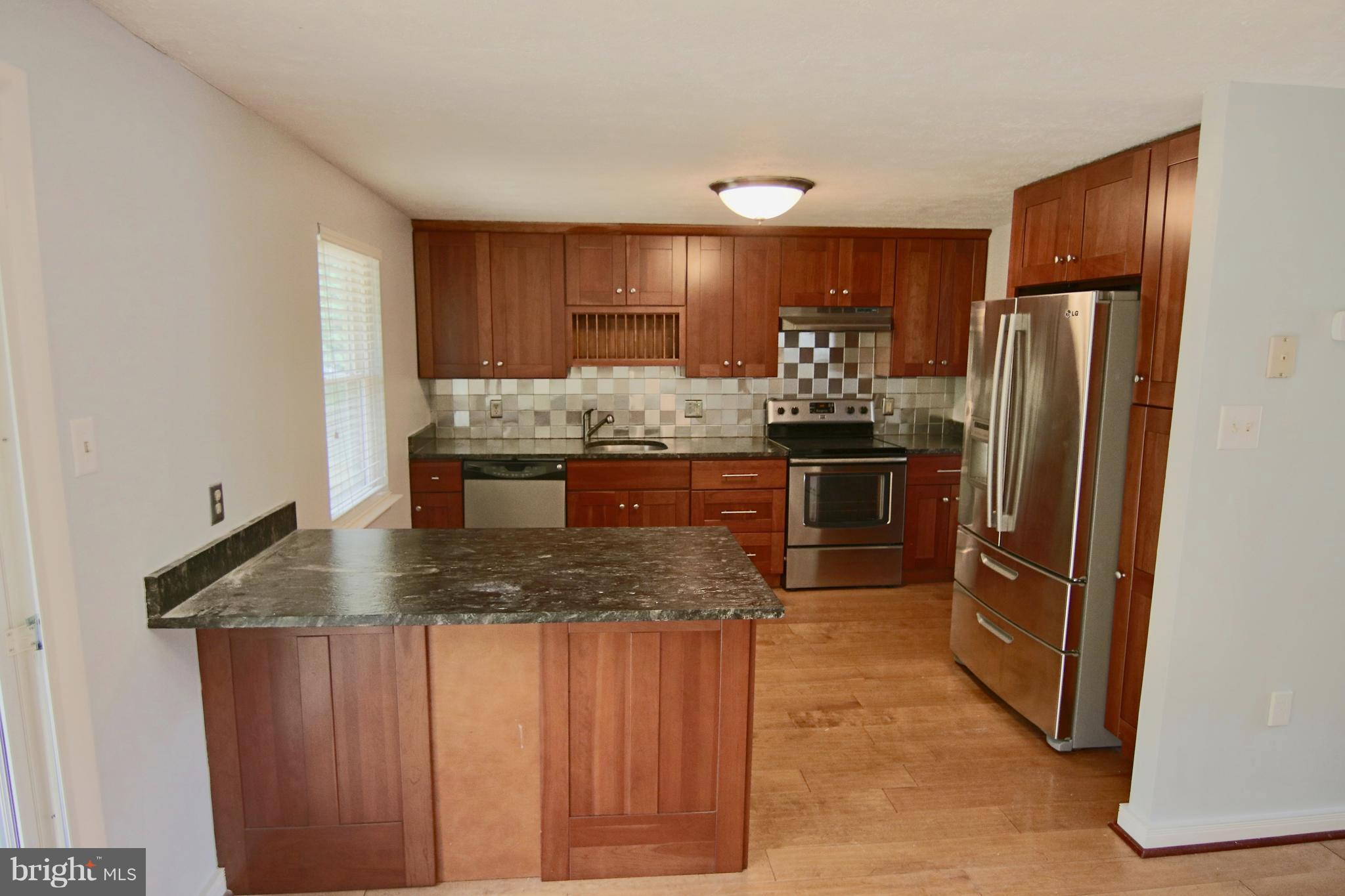 1820 Montreal Road Severn, MD 21144 - Photo 8 of 25 updated kitchen with granite and s.s. appliances