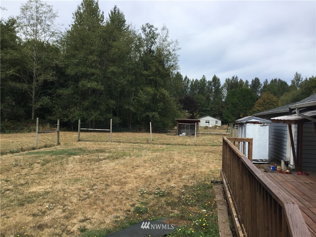 11221 180th Lane Southwest Rochester, WA 98579 - Photo 23 of 24 a view of a terrace with a garden