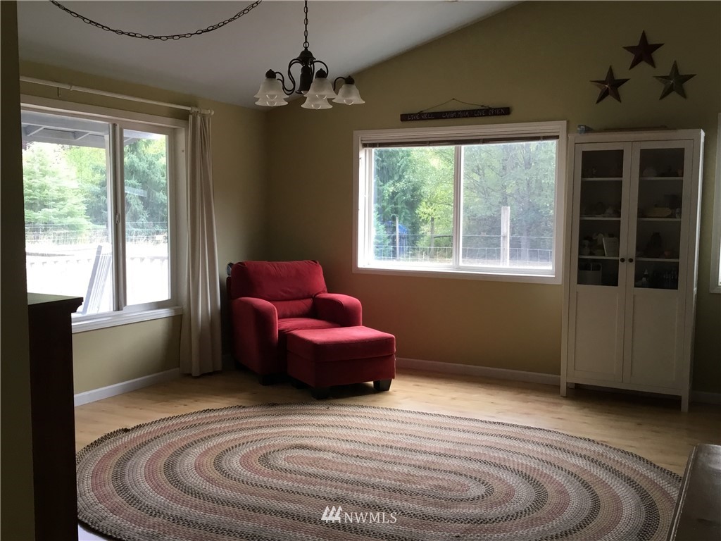11221 180th Lane Southwest Rochester, WA 98579 - Photo 7 of 24 a room with furniture and window