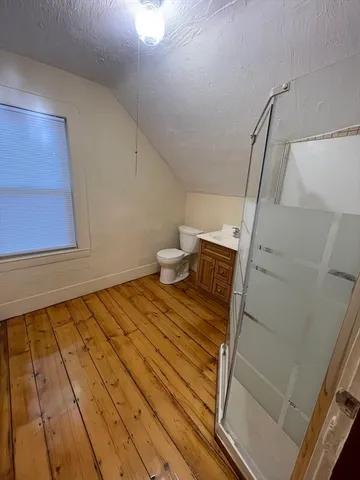 a bathroom with a sink and toilet