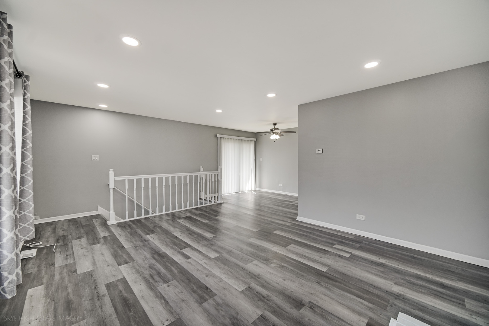 103 Red Barn Road, Unit 103 Matteson, IL 60443 - Photo 9 of 17 an empty room with wooden floor