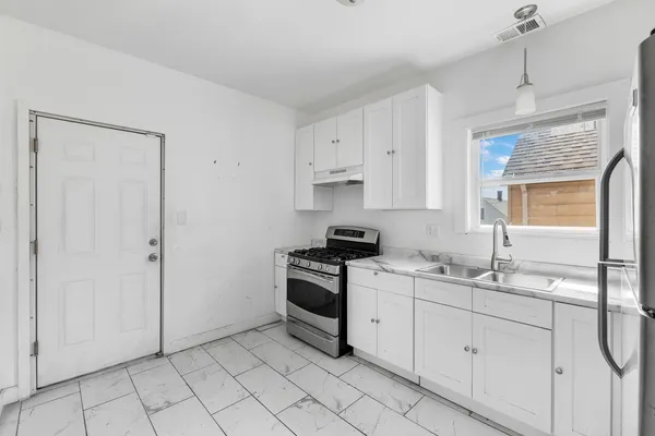 $450,000 | 8841 South Muskegon Avenue, Chicago, IL 60617