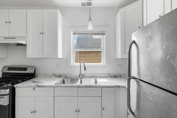 $450,000 | 8841 South Muskegon Avenue, Chicago, IL 60617