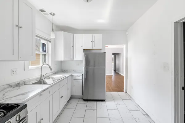 $450,000 | 8841 South Muskegon Avenue, Chicago, IL 60617