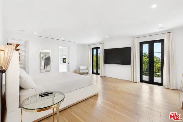 a bathroom with a sink and a shower