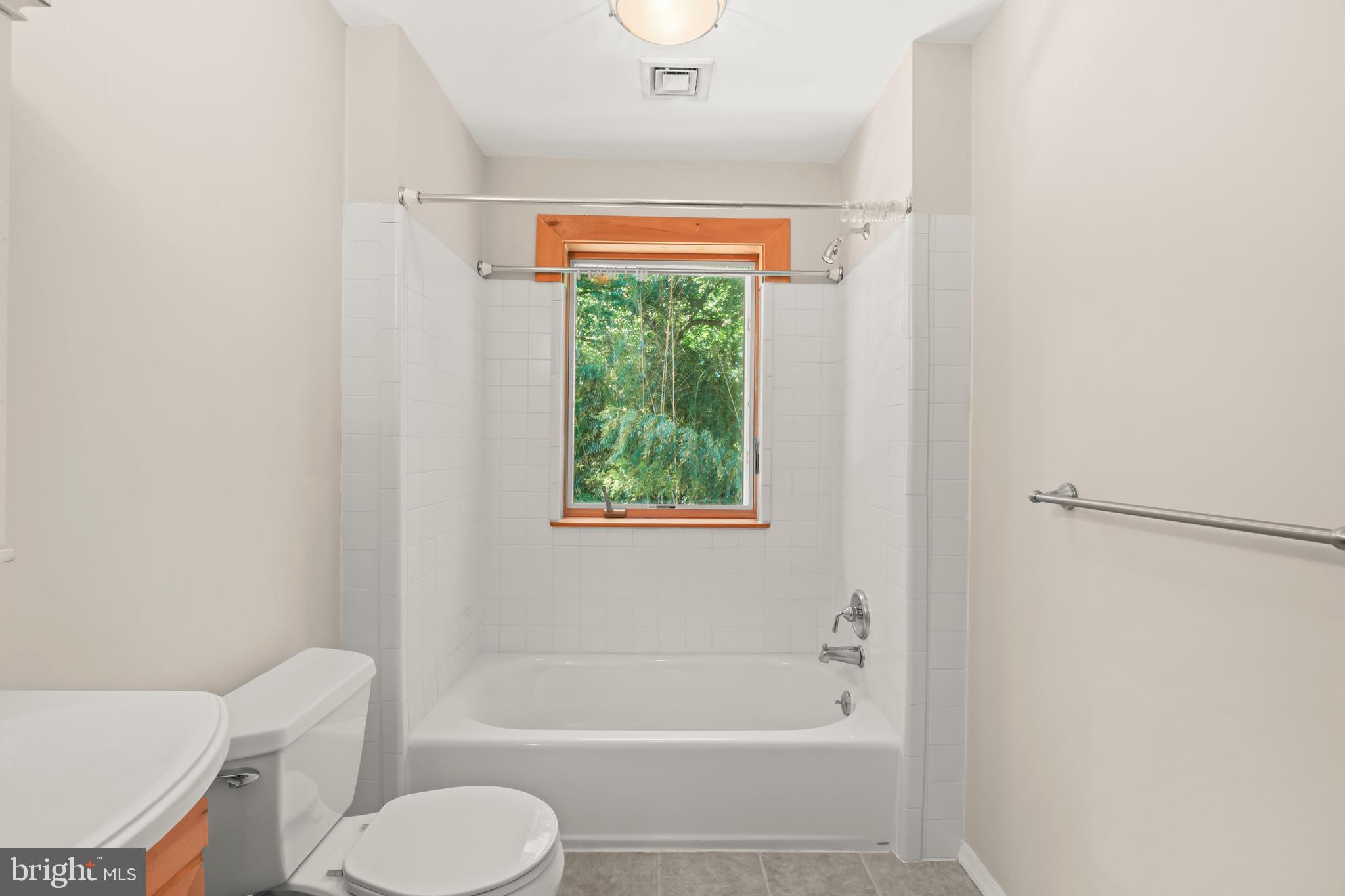 1473 North River Road Yardley, PA 19067 - Photo 37 of 42 a bathroom with a toilet and a shower