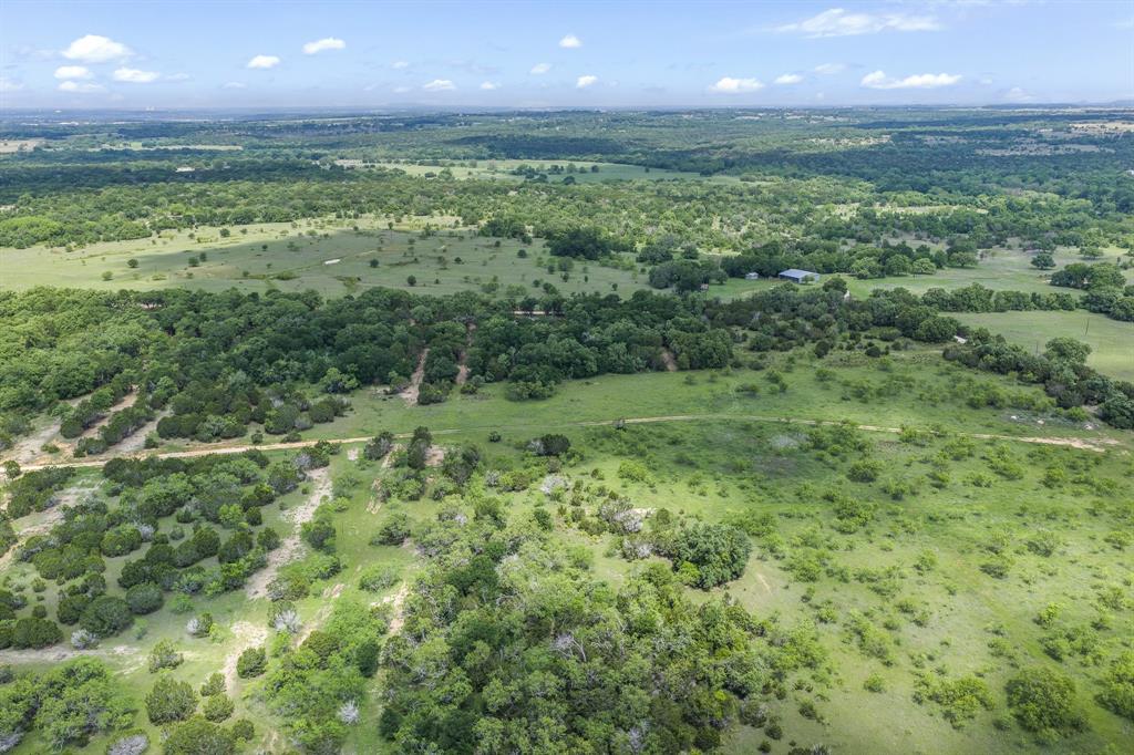 Tbd Lot 6 Tbd Road Kopperl, TX 76652 - Photo 14 of 16 a view of a green yard with an trees