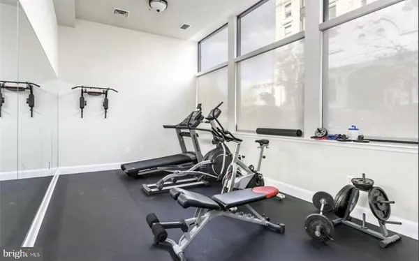 a view of a room with gym equipment