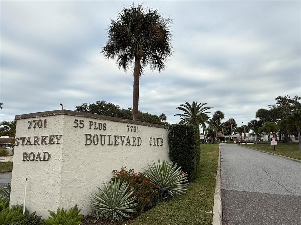 7701 Starkey Road, Unit 711 Seminole, FL 33777 - Photo 18 of 21 a view of a sign board