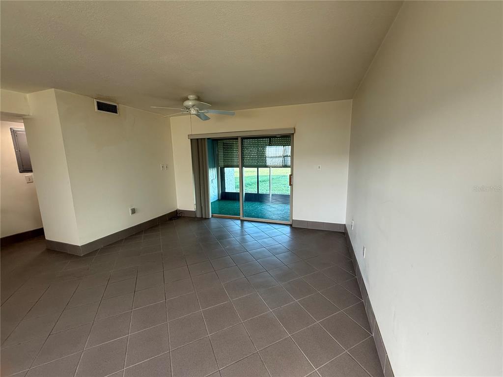 7701 Starkey Road, Unit 711 Seminole, FL 33777 - Photo 9 of 21 a view of an empty room and window