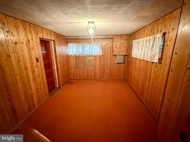 a bathroom with sink toilet and mirror