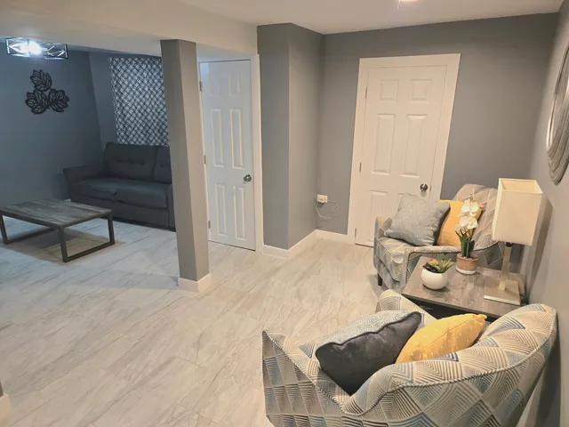 a bedroom with a bed and furniture