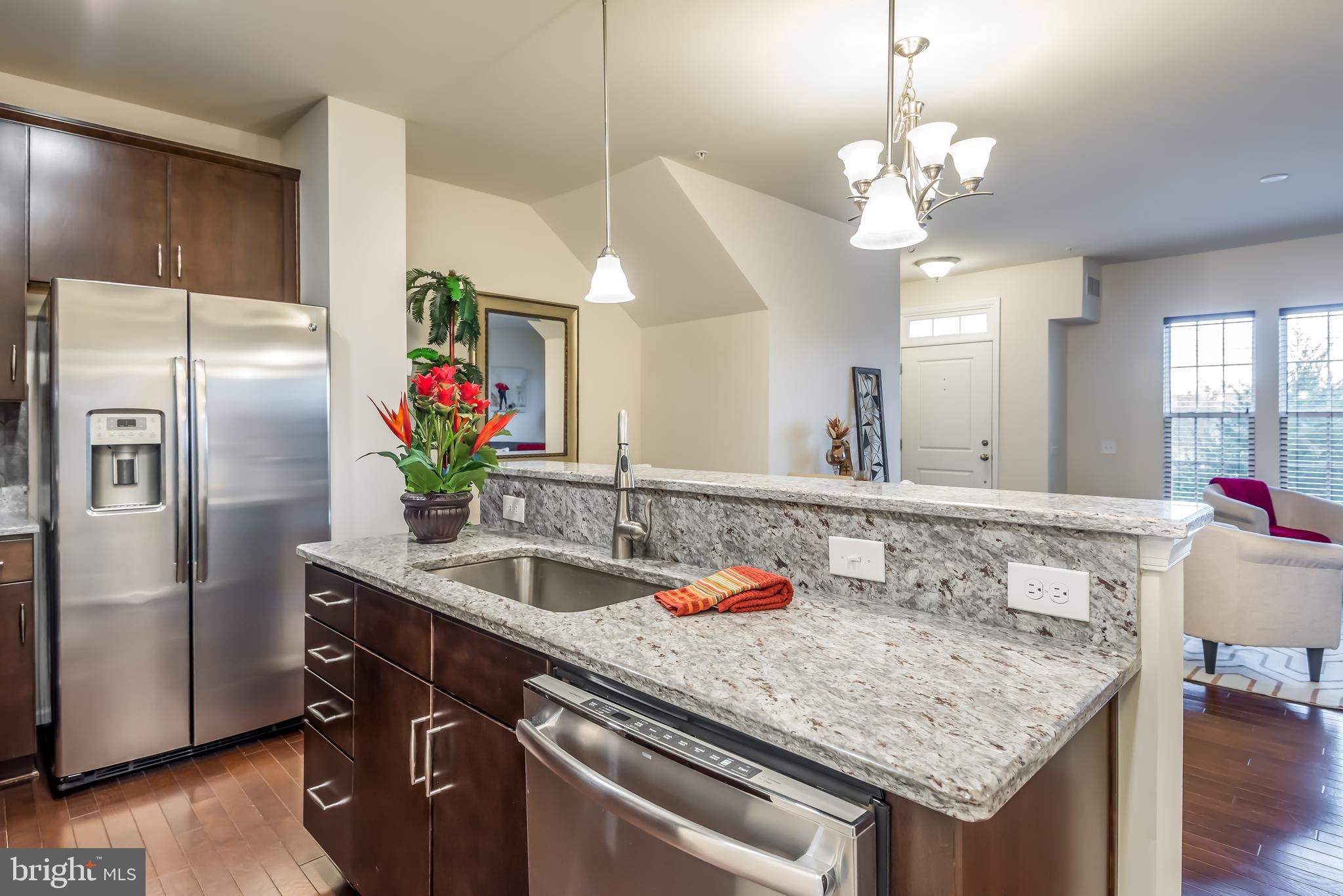 43503 Town Gate Square Chantilly, VA 20152 - Photo 8 of 25 Kitchen with granite counter tops & SS appliances