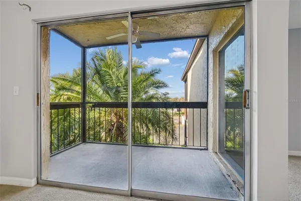 a view of a garden from a balcony