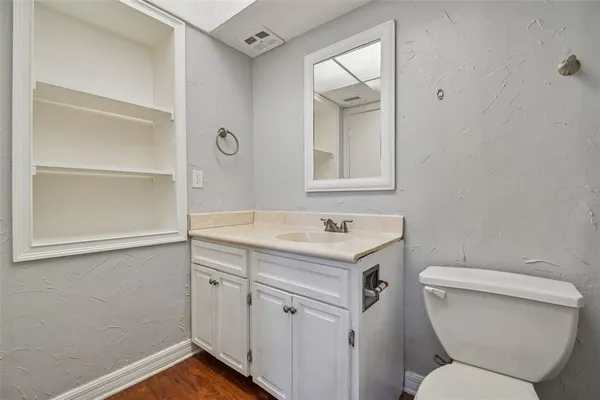 a bathroom with a sink a toilet and a bathtub