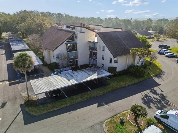an aerial view of a house with a garden