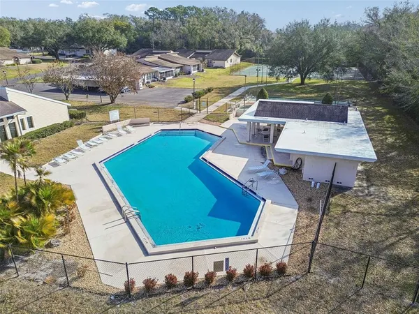 an aerial view of a house with a ocean view