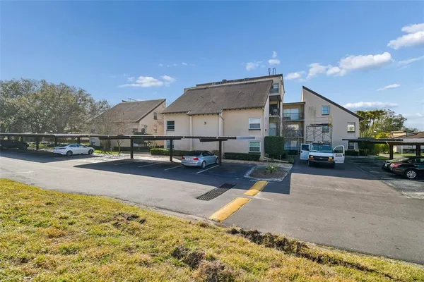 a view of a street with a building in the background