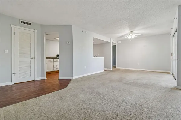 a view of a kitchen with a sink and cabinet area