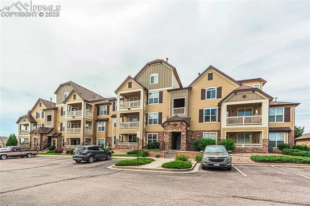 a front view of a building with street view