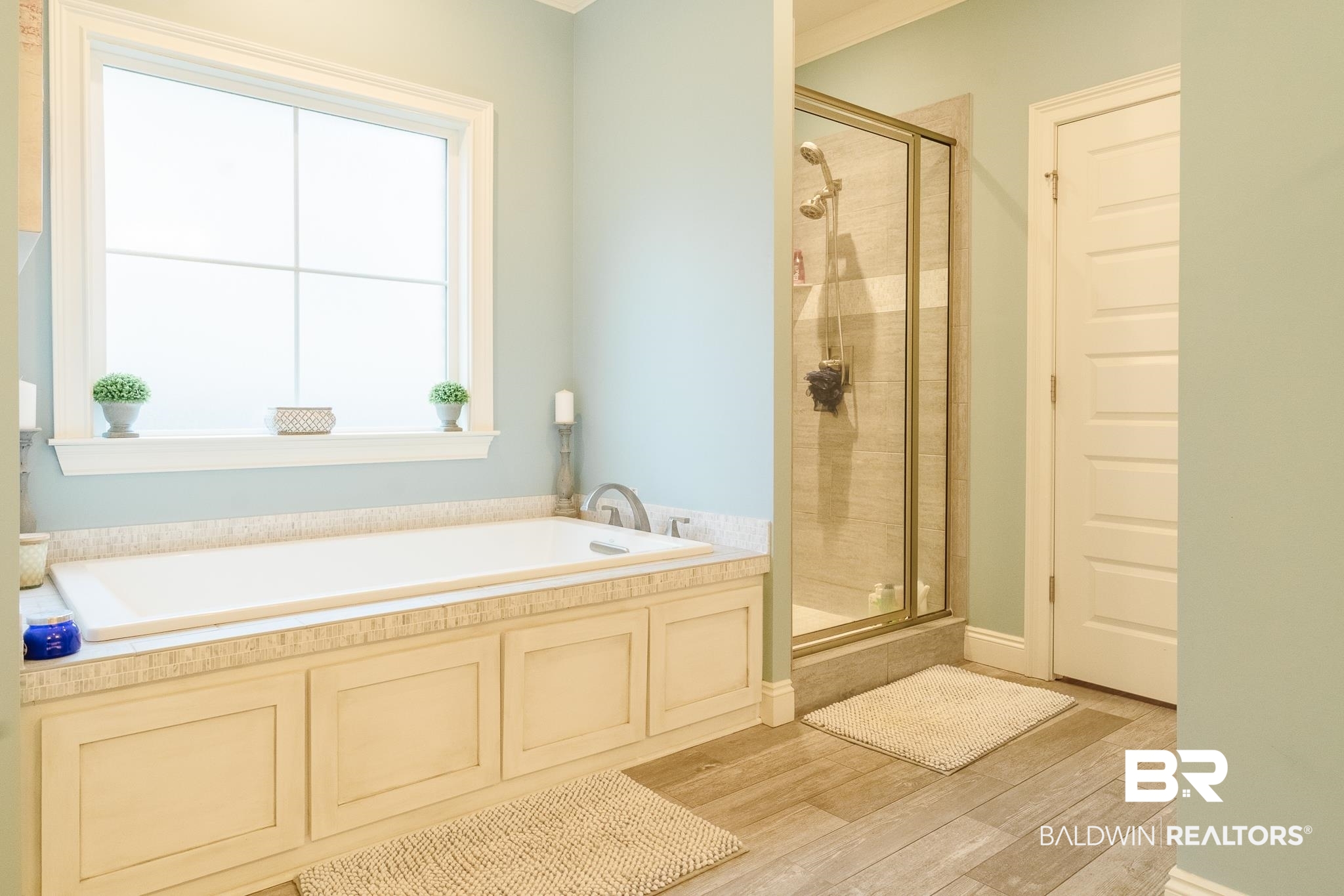 7235 Raleigh Way Mobile, AL 36695 - Photo 18 of 52 Full bathroom with wood finished floors, a garden tub, and a shower stall