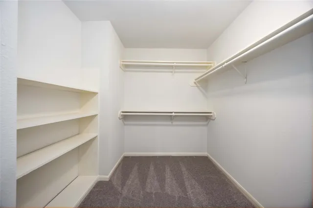 a view of an empty walk in closet