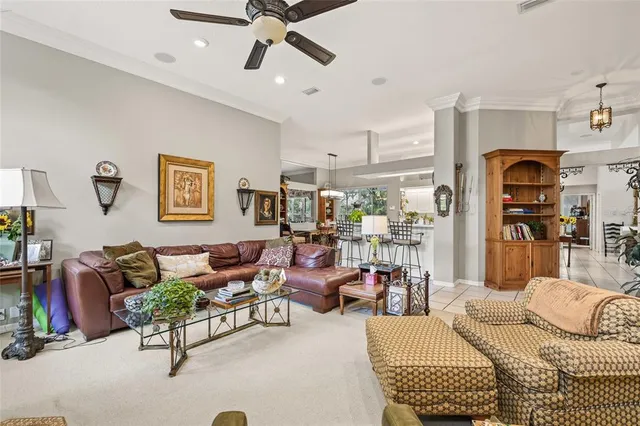 a view of a bedroom with a bed and a window