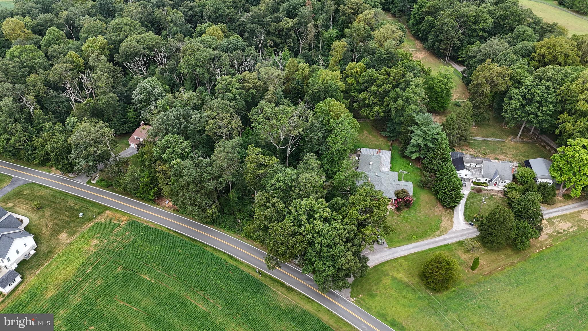 Dennings Road New Windsor, MD 21776 - Photo 14 of 19 an aerial view of green landscape with trees