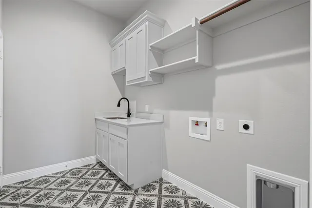 a view of a hallway with cabinets