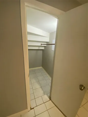 a bathroom with a close shower view