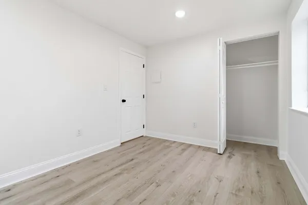 a view of small space with wooden floor