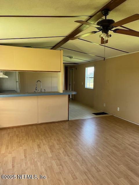 10287 Southwest 113th Street Starke, FL 32091 - Photo 7 of 8 a view of a room with wooden floor