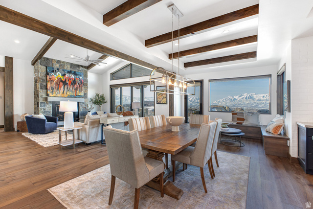 1282 Chimney Rock Road, Unit 344 Heber City, UT 84032 - Photo 11 of 55 Expansive open-concept living space with vaulted ceilings featuring exposed wood beams